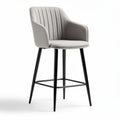 Upholstered bar stool with armrest in light gray fabric and black metal legs